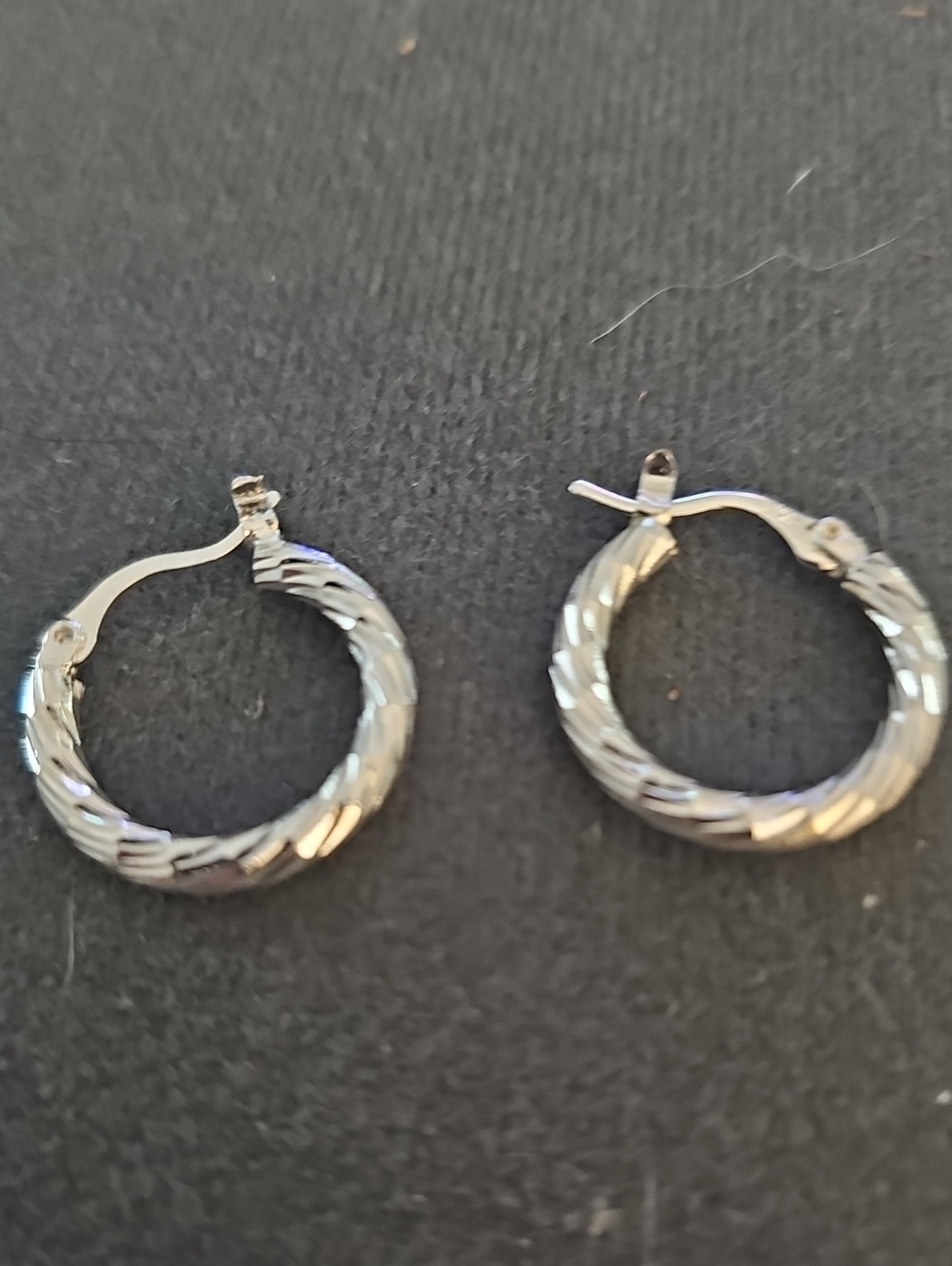 Unbranded Diamond Cut Twisted Hoop Earrings Womens Size OS Silver Tone Classic